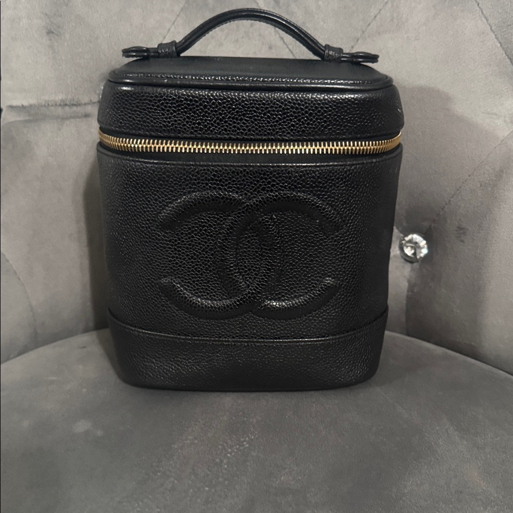 CHANEL Black Leather Cosmetic Case with Gold Accents